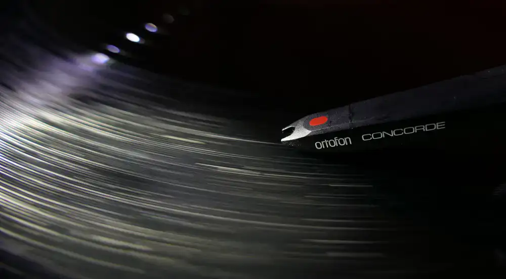 Close up of a stylus on a spinning vinyl record