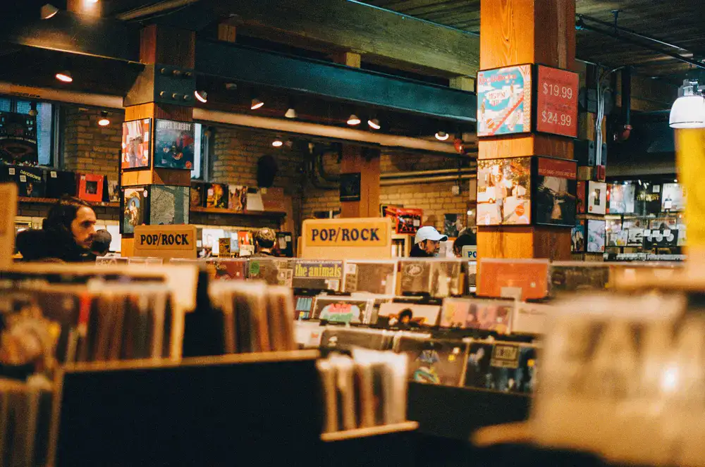 Customers browsing vinyl records in our shop